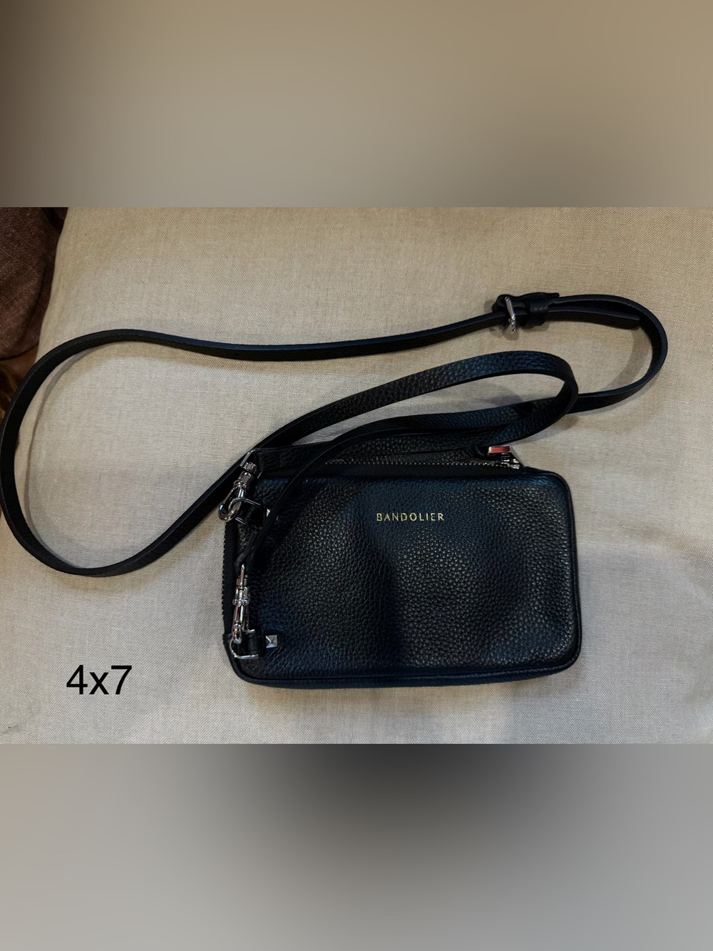 Bandolier Black Pebbled Leather Crossbody expanded pouch